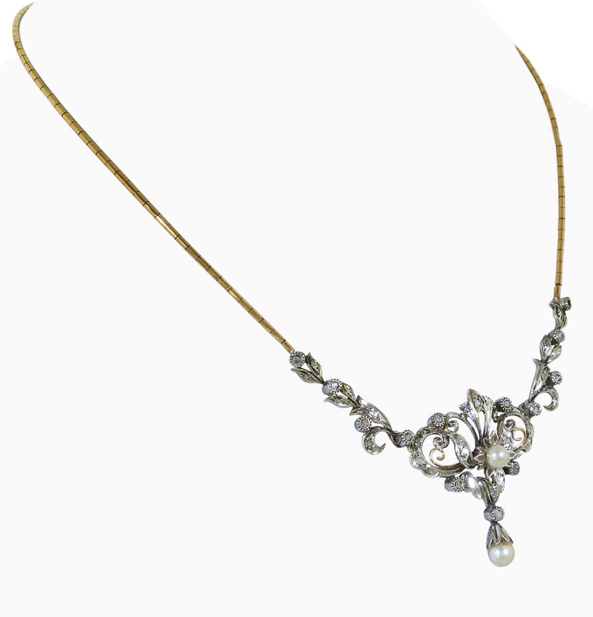 Collier mit 18Kt Goldkette, Mittelteil Silber/Golddubliert mit Rohdiamanten und Diamantrosen und Perlchen gefasst.